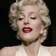 Gillian Anderson as Media, depicting herself as Marilyn Monroe.